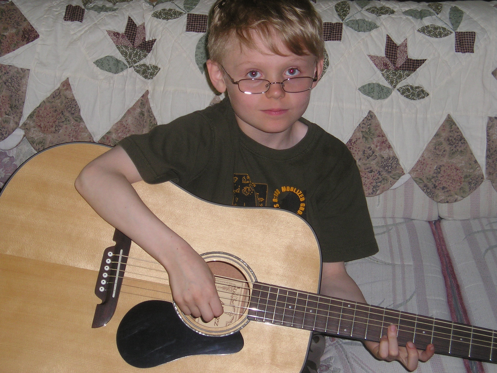 Me playing guitar as a child